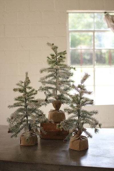 ARTIFICIAL PINE TREE WITH SNOW DETAIL AND BURLAP POT